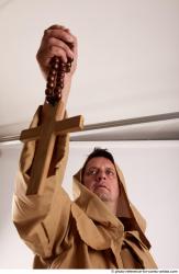 JOEL_ADAMSON MONK WITH CRUCIFIX